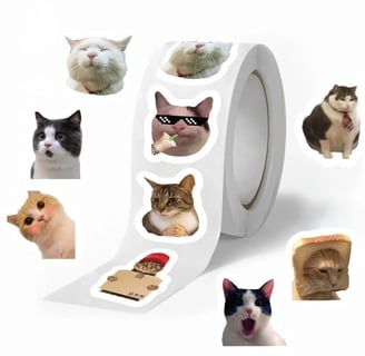 a roll of stickers with a meme cat on it