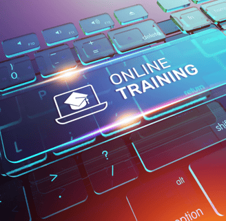a laptop computer keyboard with a blue and white online training
