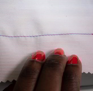 Straight stitch on pink fabric