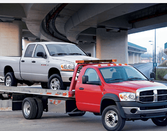 Flatbed towing junk truck