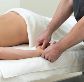 a man is getting a massage at a massage