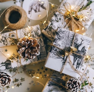 gift boxes wih white paper and lights