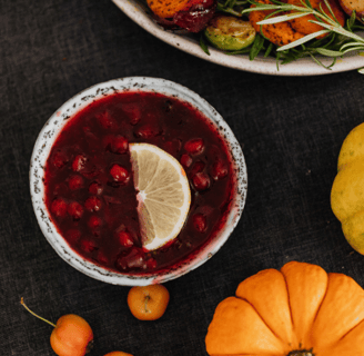 cranberry sauce with some fruits on the table