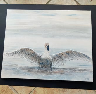 Paintings of a bird on water during winter
