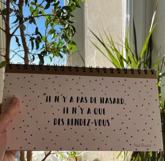 Cahier de Magali Strassel avec la citation d'Eluard, Il n'y a pas de hasard, il n'y a ques des RDV