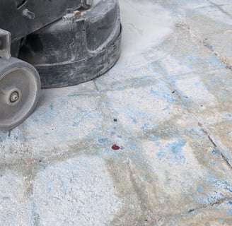 Lavina Concrete Grinder grinding and removing thinset