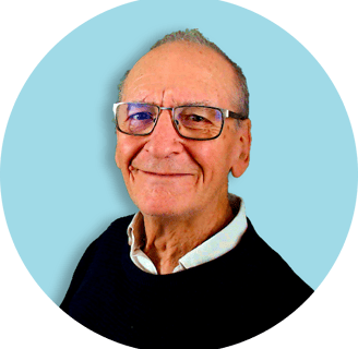 a man with glasses and a black sweater