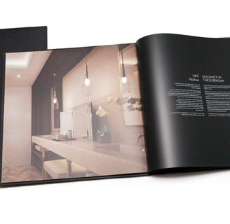 a book opened to show a book with a picture of a bathroom