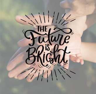 a person holding a hand with the words, the future is bright and bright