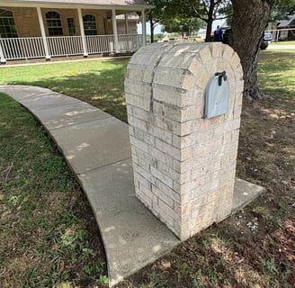 Mail Box and Side walk cleaned and bright.  Krum Texas
