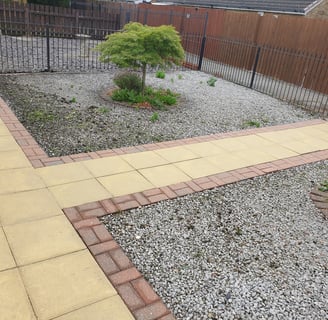After photo of a patio and garden path in Hull, professionally jetwashed to restore a bright, fresh