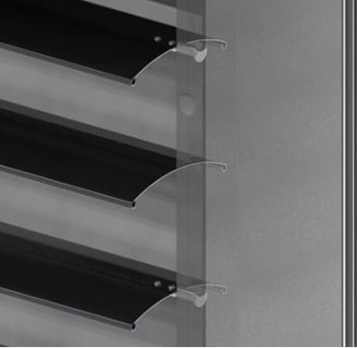 a close up of a metal rack with several shelves