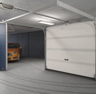 a garage door with a yellow car parked in front of it