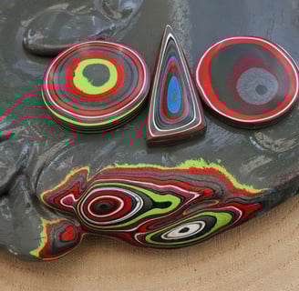 "Colorful layered Fordite cabochons handcrafted from recycled automotive paint, ideal for unique jew