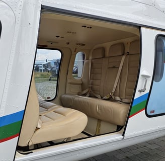 Agusta AW119Kx Koala VIP helicopter with luxury seating and Garmin avionics.