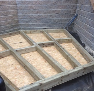 timber frame base for garden room ready for insulation