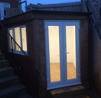 garden room with doors and windows