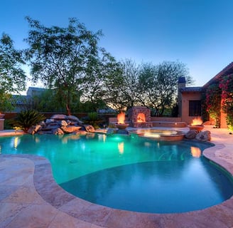 a pool with a waterfall