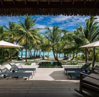 he Brando:  A serene private villa emerges amidst swaying palm trees on a pristine, white-sand beach