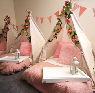 teepee slumber hire enchanted flower theme with garland