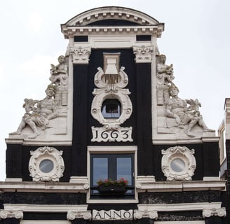 Gable stone of old house in Amsterdam