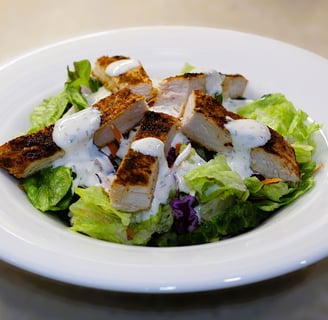 Blacked Chicken over Salad