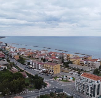 a city street scene with a view of a city torre melissa