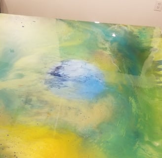 a painting of a table with a painting on it