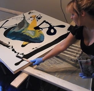 I am in gloves and painting an abstract painting