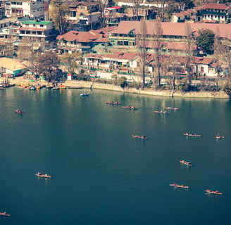 a group of people in canoes in the water