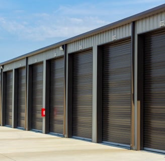 a row of storage units with doors closed