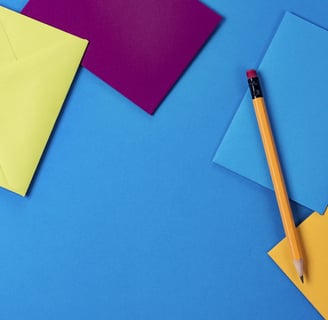 a pencil and pencil on a blue background