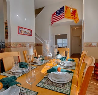 a dining room table with flags in florida