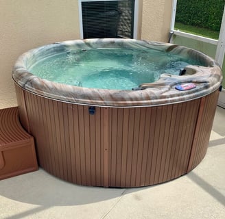 a hot tub on patio deck