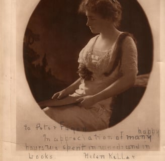 a photo and a short letter written by Helen Keller to Peter Fagan
