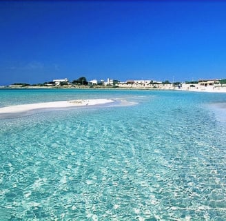 Punta Prosciutto Beach, Puglia – Pristine white sand dunes and crystal-clear turquoise waters, an un