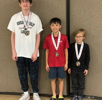 The first champions of a Vegas Chess Coach tournament for beginners.