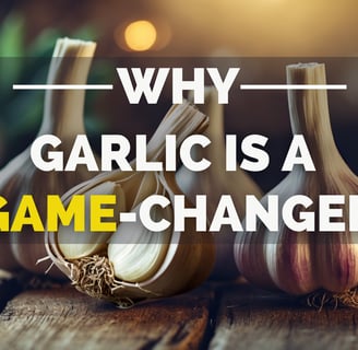 Three garlic bulbs on a wooden surface, one sliced to reveal the inside.