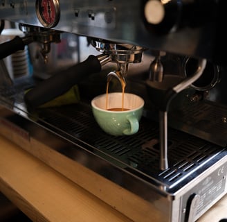 La Marzocco coffee machine is being used to make a cup of coffee