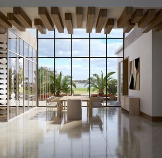 a dining room with a table and chairs
