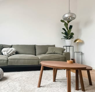 a living room with a couch and a table