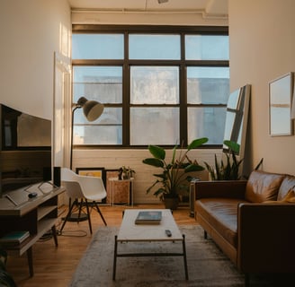 a living room with a couch and a television