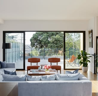 a living room with a couch and a table