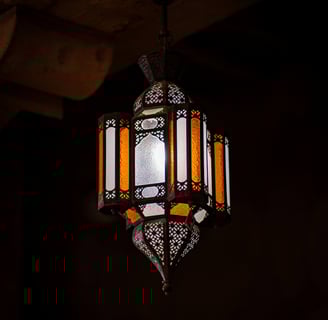 a lamp hanging from a ceiling in a room