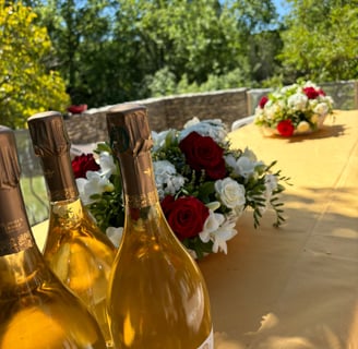 composition foral et bouteille de champagne mademoiselle a selon aïnoa