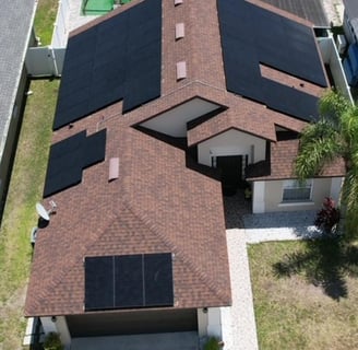 a house with solar panels installed on a roof