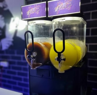 SweetAz Co. slushie machine with ice cold Cola and Pina Colada slushie at event in Redlands