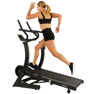 women running on treadmill