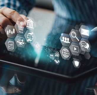 a man holding a tablet with icons and icons