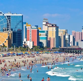 mrytle beach south carolina with people on the beach and a ferris wheel, vacation, sun and fun